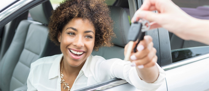 New car owner getting the keys