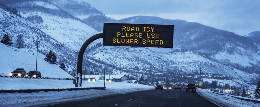 Cars on an icy mountain highway